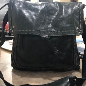 The sak black shoulder or backpack bag
